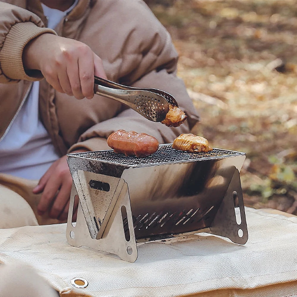Portable Folding Stainless Steel Camping Wood Burning Stove with Grill Plate N3045