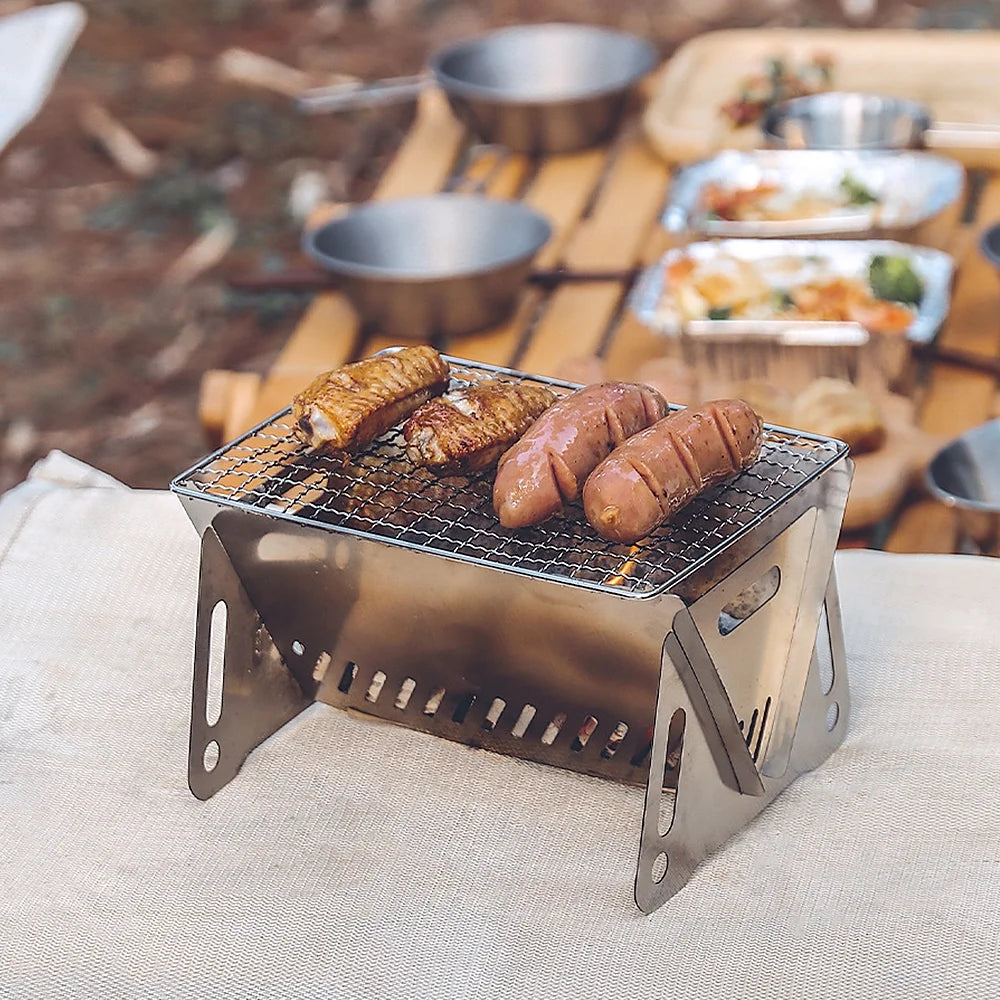 Portable Folding Stainless Steel Camping Wood Burning Stove with Grill Plate N3045